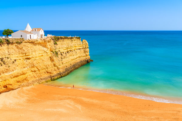 White small church on top of cliff at Armacao de Pera beach, Algarve region, Portugal Copyright Pawel Kazmierczak
