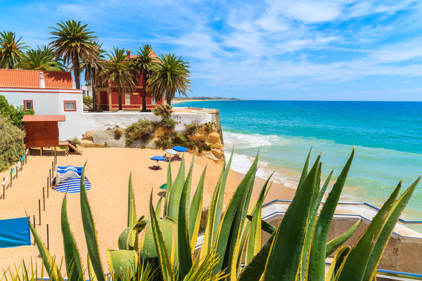 A beautiful beach in Armacao de Pera coastal town, Algarve region, Portugal by Pawel Kazmierczak